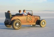 Lil' Tommy at the wheel, with his dad Tom & bro Kyle along for the ride.