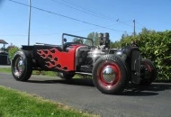 The body is widened 4 inchs,channeled over a boxed model A frame,and the box is home made as well as the windshield frame.