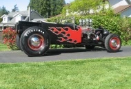 Firestone 8-20 on the back and 500 on the front.The car has a 55 Chevy rearend,46 Ford frontend,split wishbones, with a set of Smithy's Mufflers.