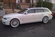 2009 BMW 535xi wagon white with tan leather & color matched 22" wheels.